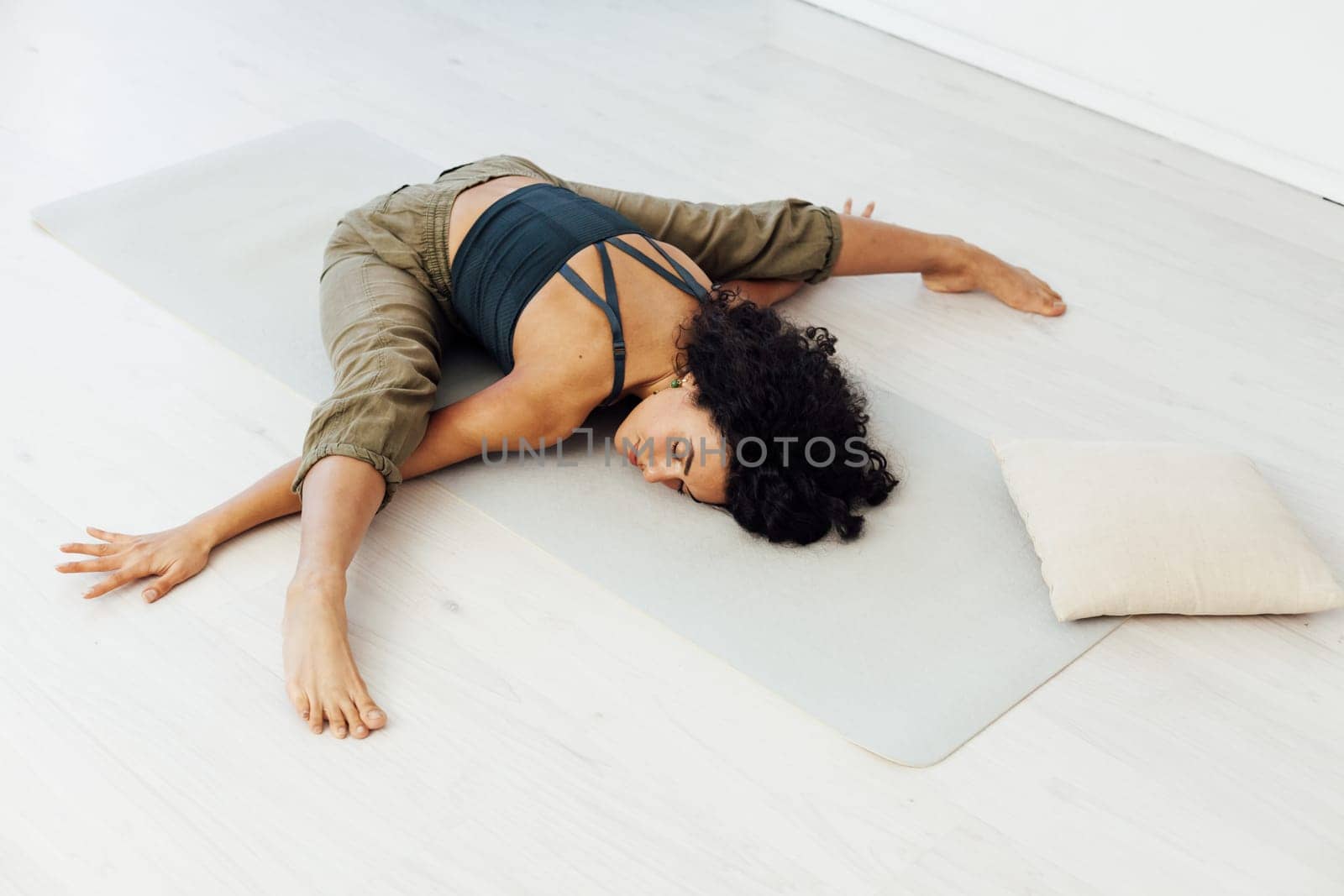 Sporting beautiful woman yoga asana gymnastics flexibility body