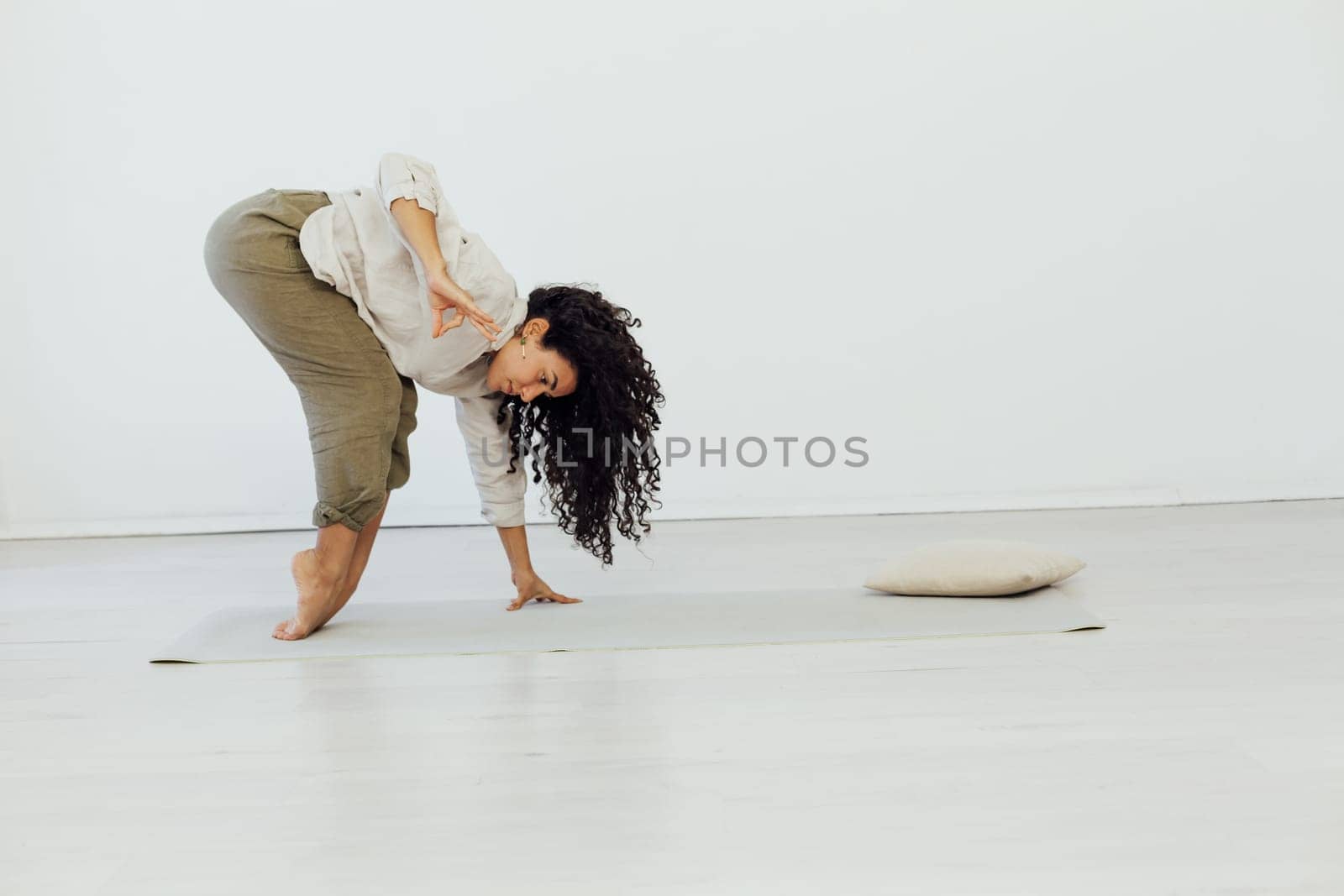 Beautiful woman yoga asana gymnastics flexibility body fitness sport