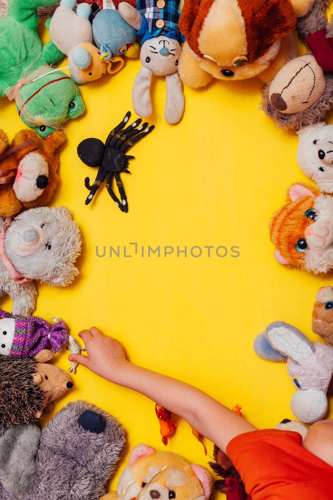 lots of children's soft toy for developing games as a background by Simakov