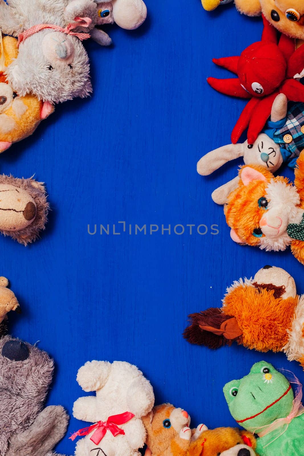 lots of children's soft toy for developing games as a background by Simakov