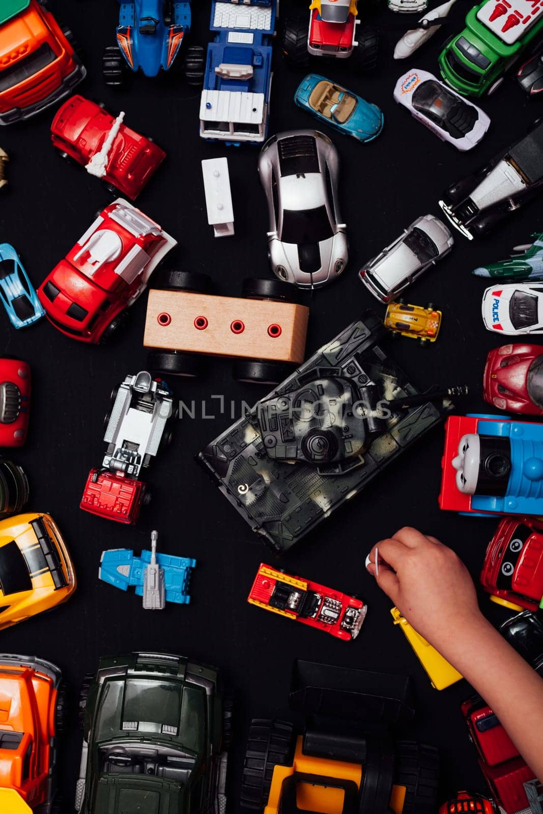 lots of baby car toys for games as a backdrop