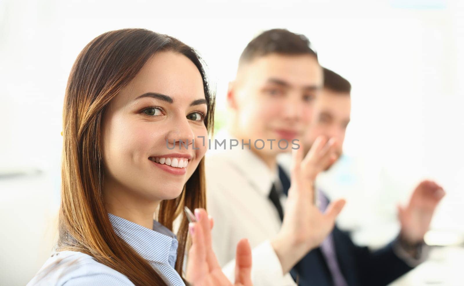 Portrait of young ambitious people at business conference by kuprevich