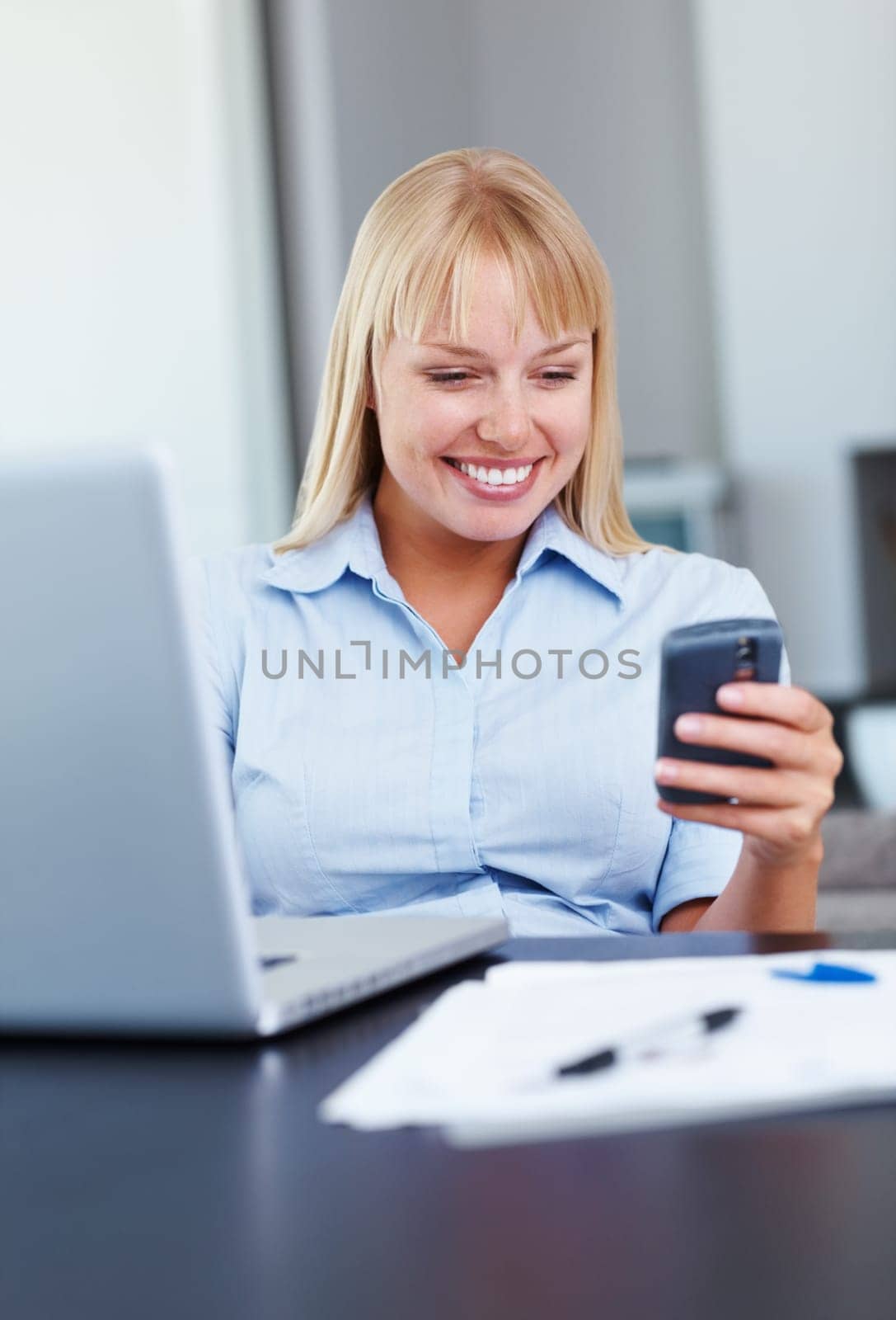 Business, woman and phone with typing or happy for text message, networking or internet chat in office. Entrepreneur, person and smartphone or smile with texting, communication and email at workplace.