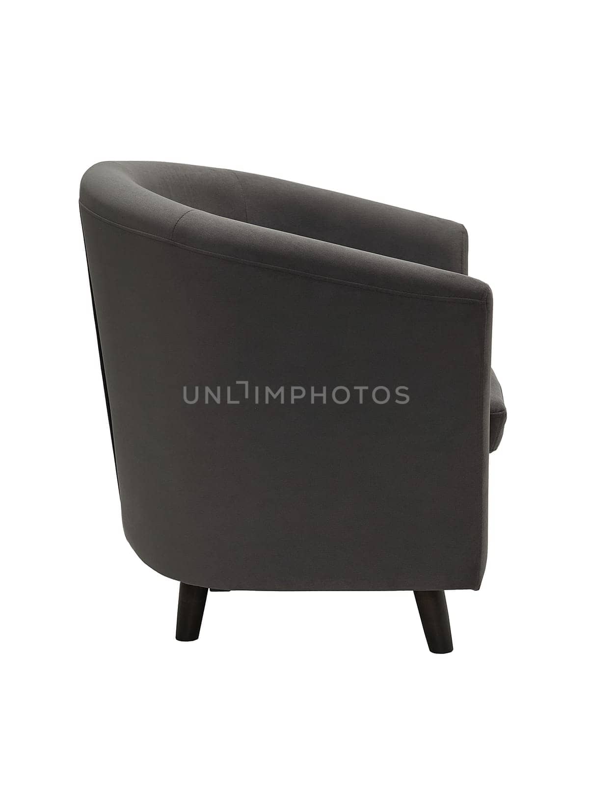 modern gray fabric armchair with wooden legs isolated on white background, side view.