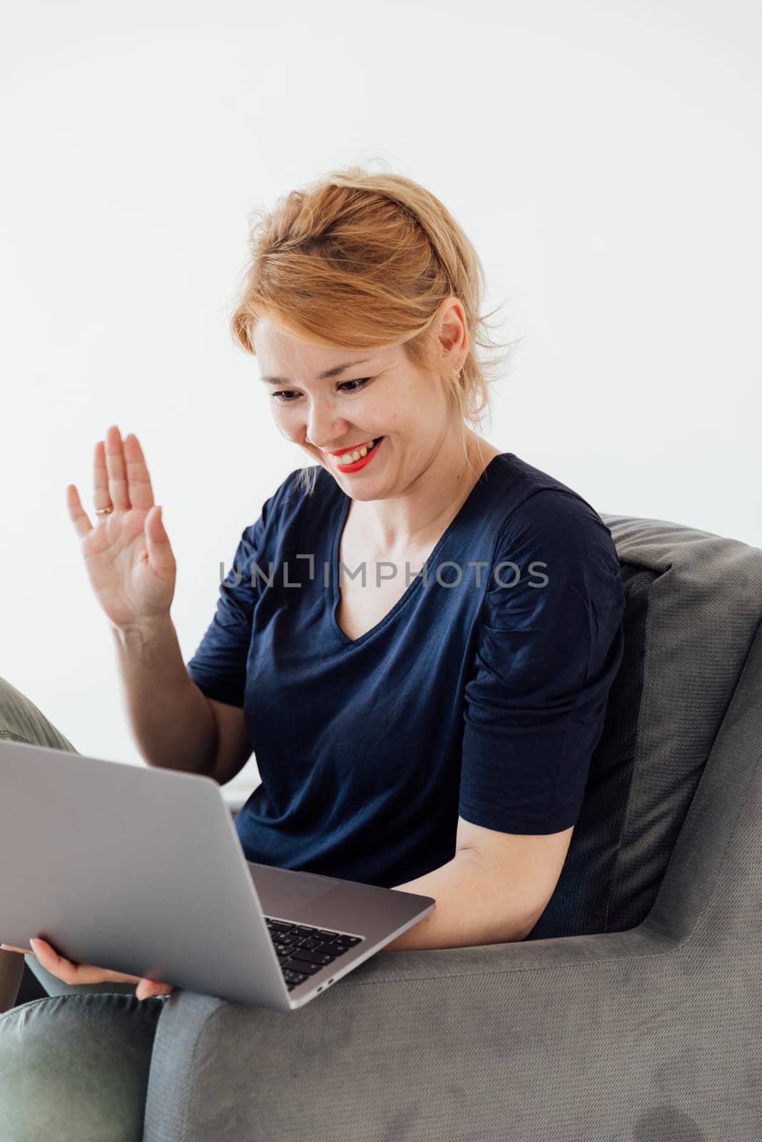 woman working online on computer at home