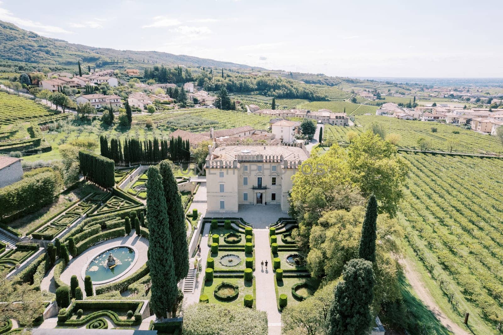 Luxurious green garden with fountains near Villa Rizzardi. Valpolicella, Verona, Italy. Drone by Nadtochiy