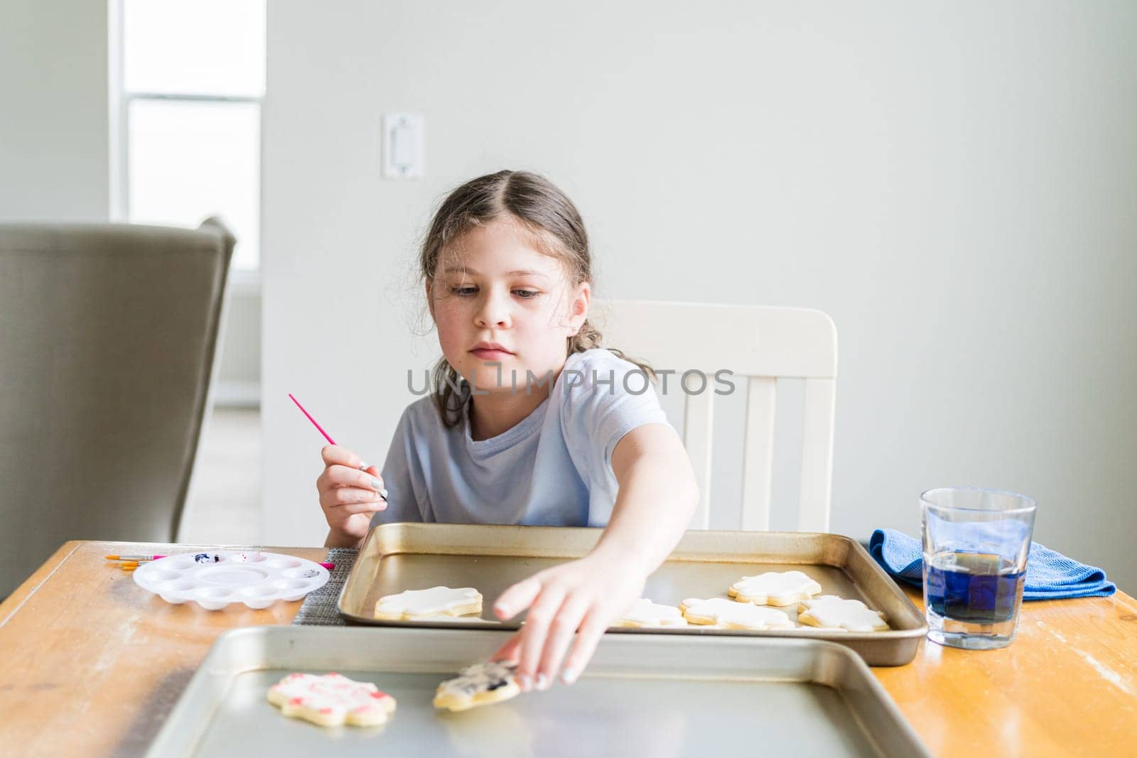 Little Girl Spells 'Sorry' on Iced Sugar Cookies by arinahabich