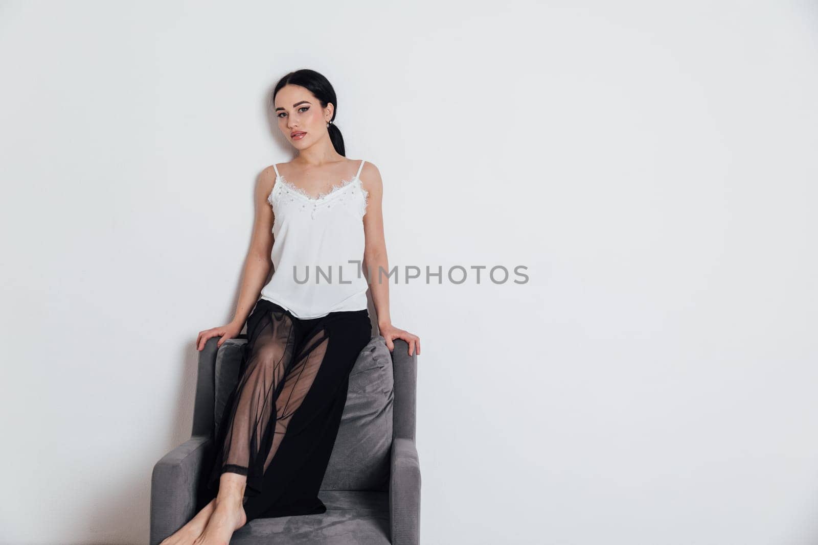 Portrait of beautiful young woman in home clothes