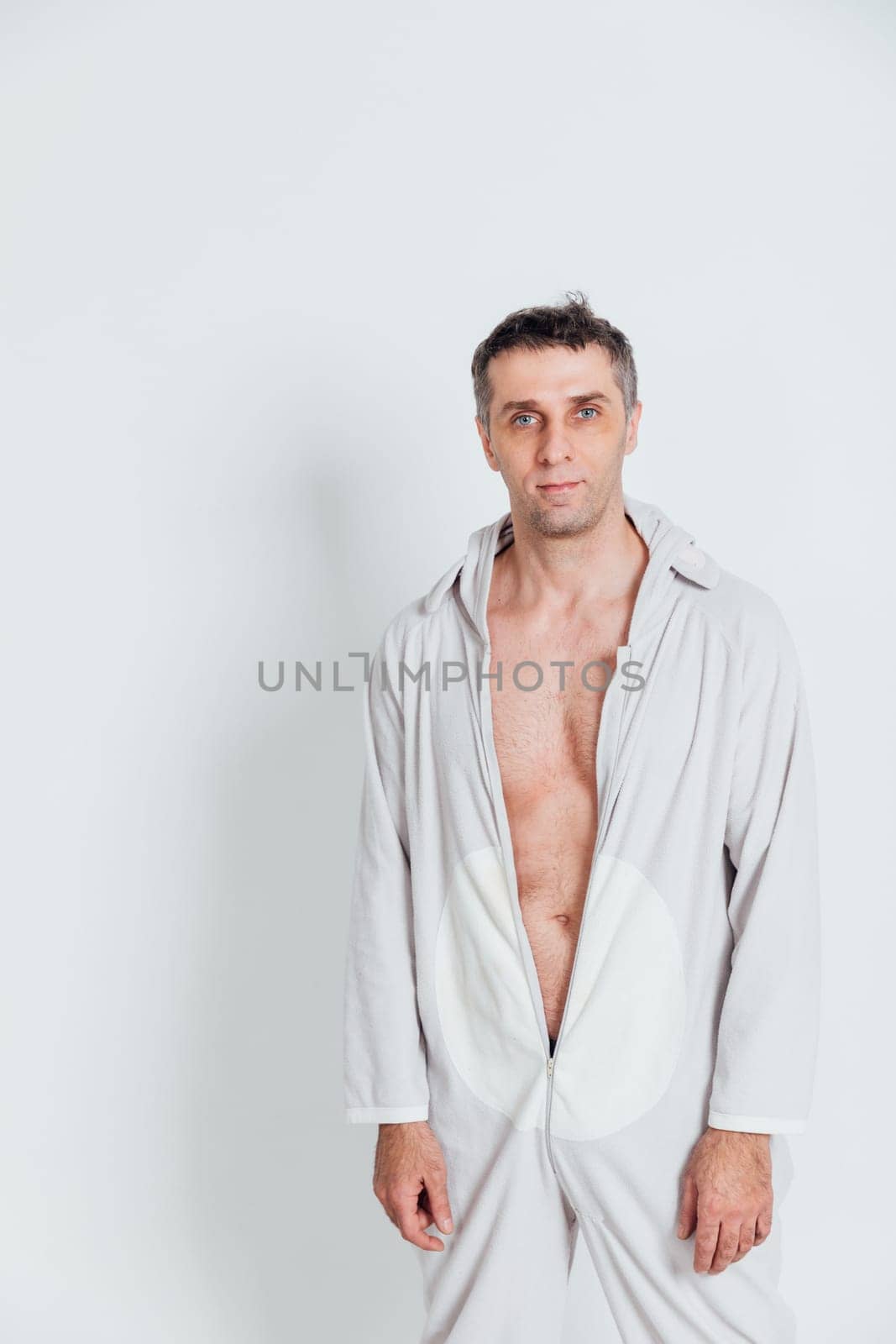 Man in pajamas in bedroom