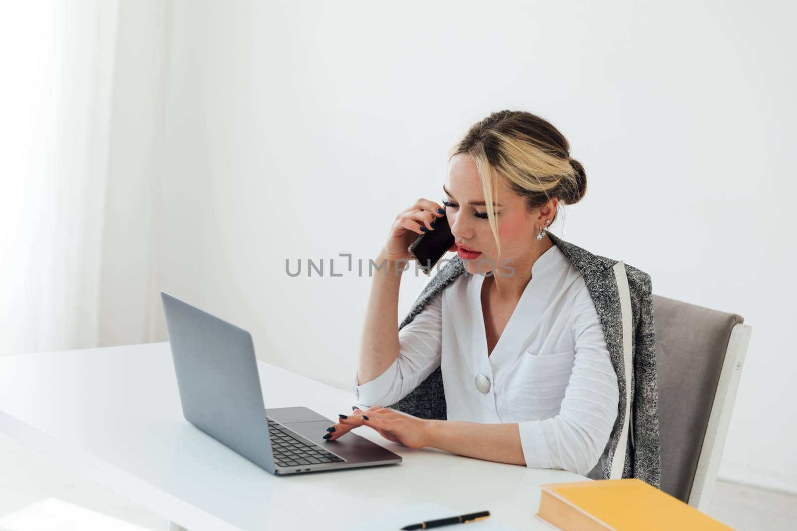 Woman talking on the phone about work