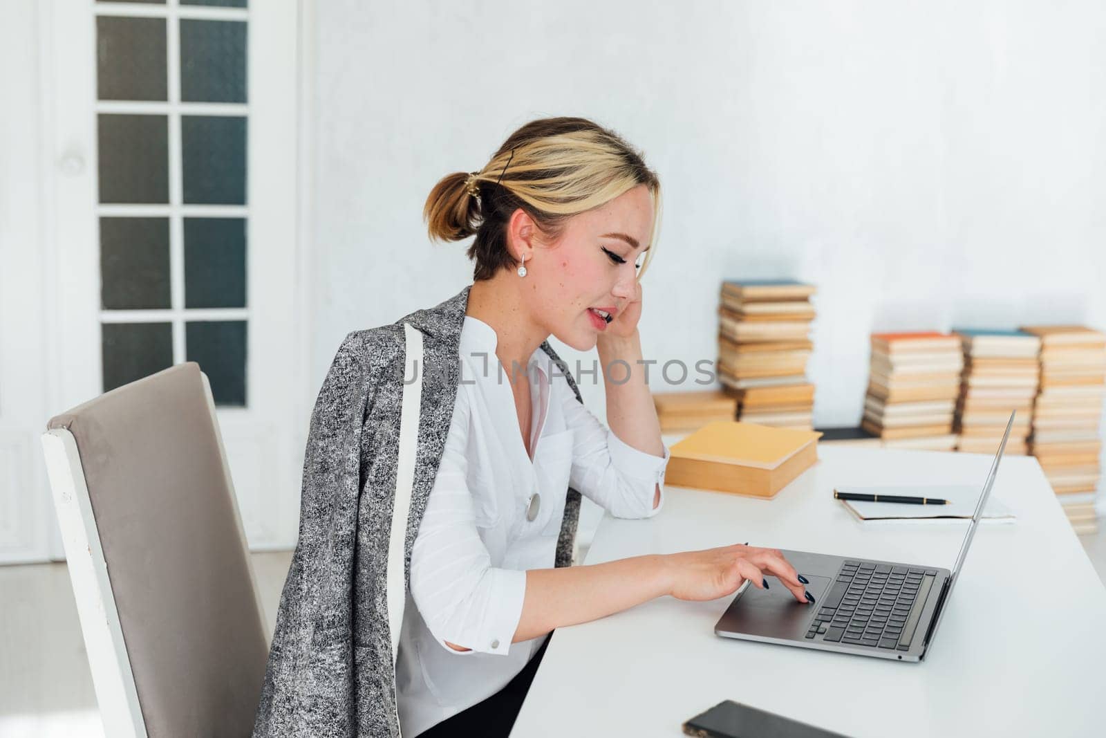 Woman talking on the phone about work