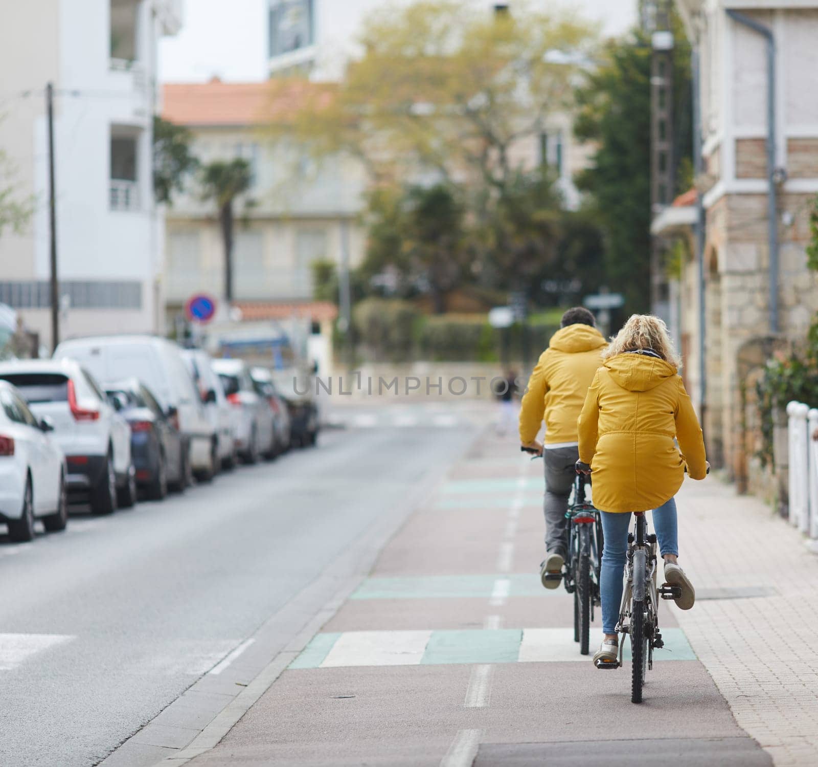 Person riding a bicycle on a cycle path a sunny day