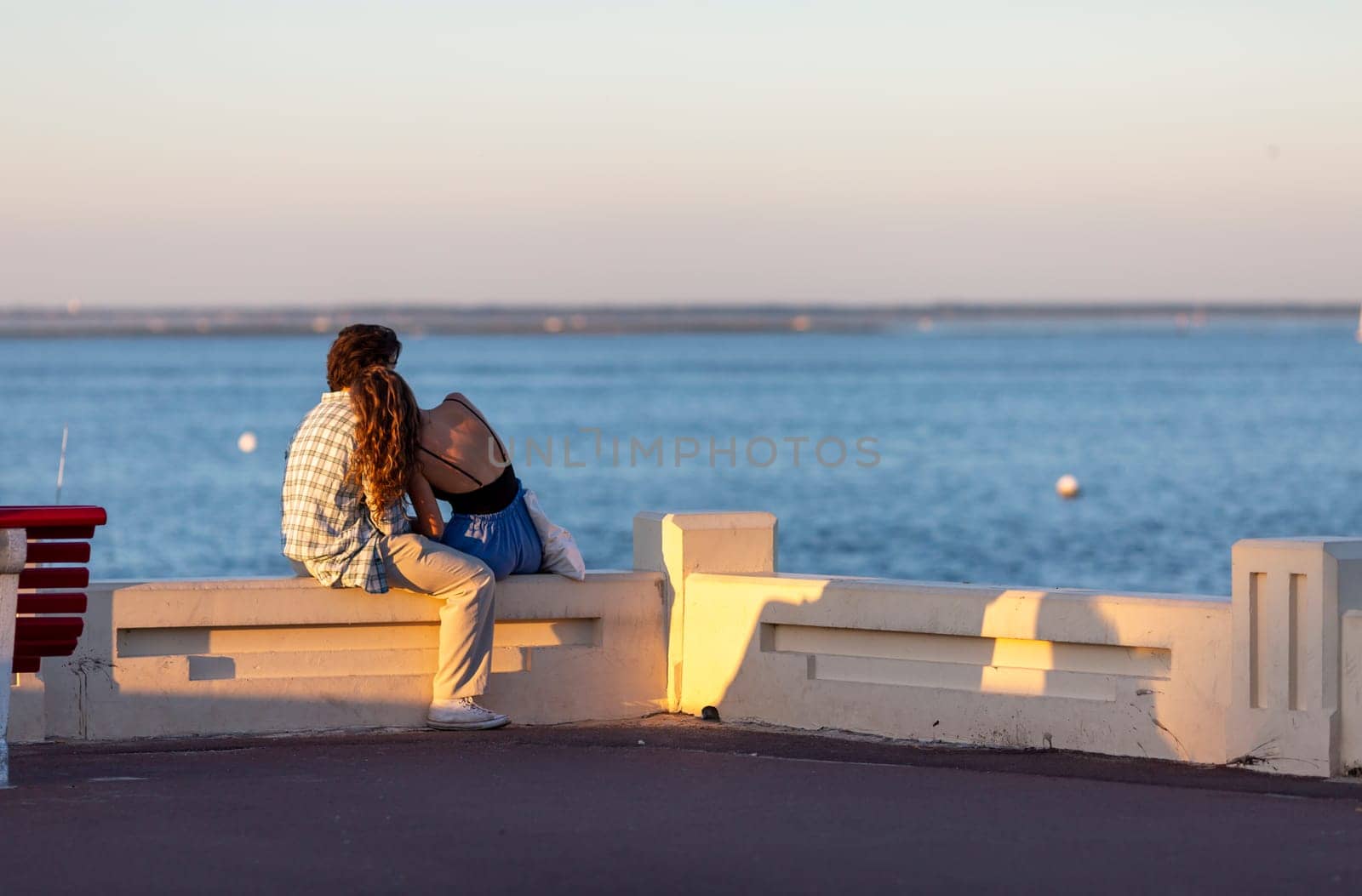 young Couple looking at the sea
