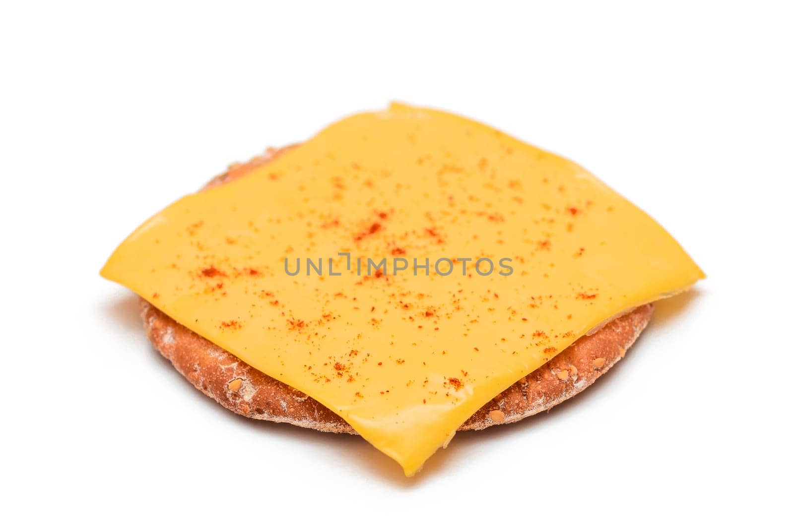 Crispy Cracker Sandwich with Cheese and Paprika - Isolated on White