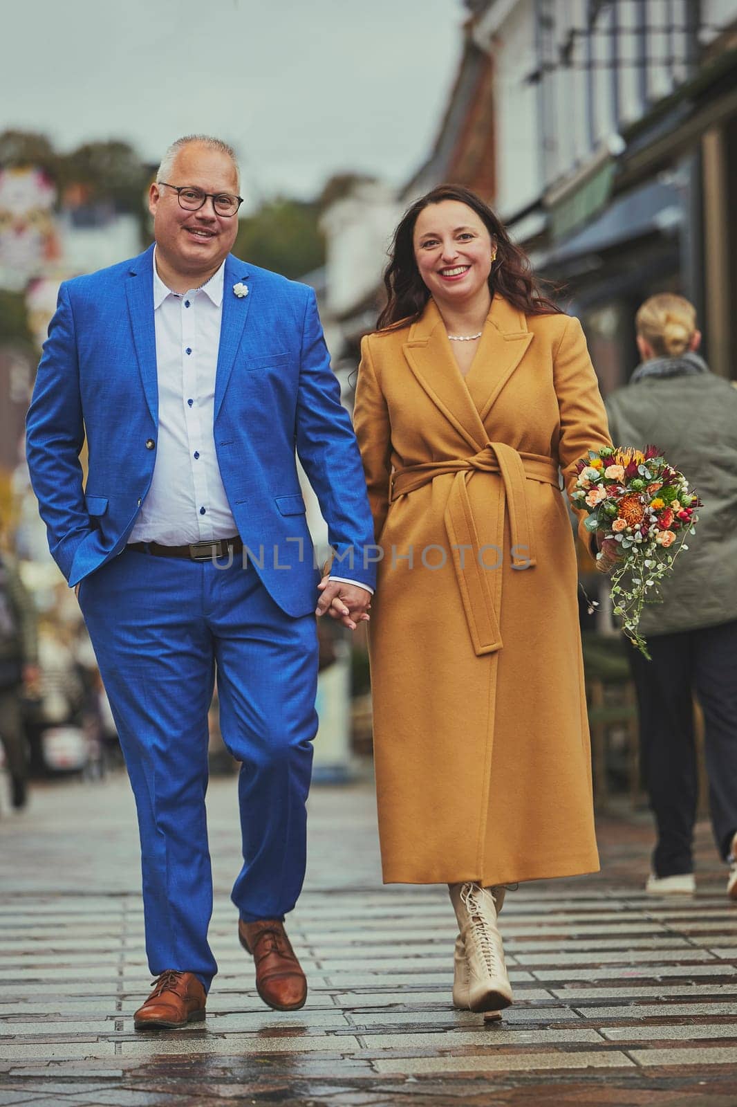 Vejle, Denmark, October 26, 2023: Couple in love walking in the city.