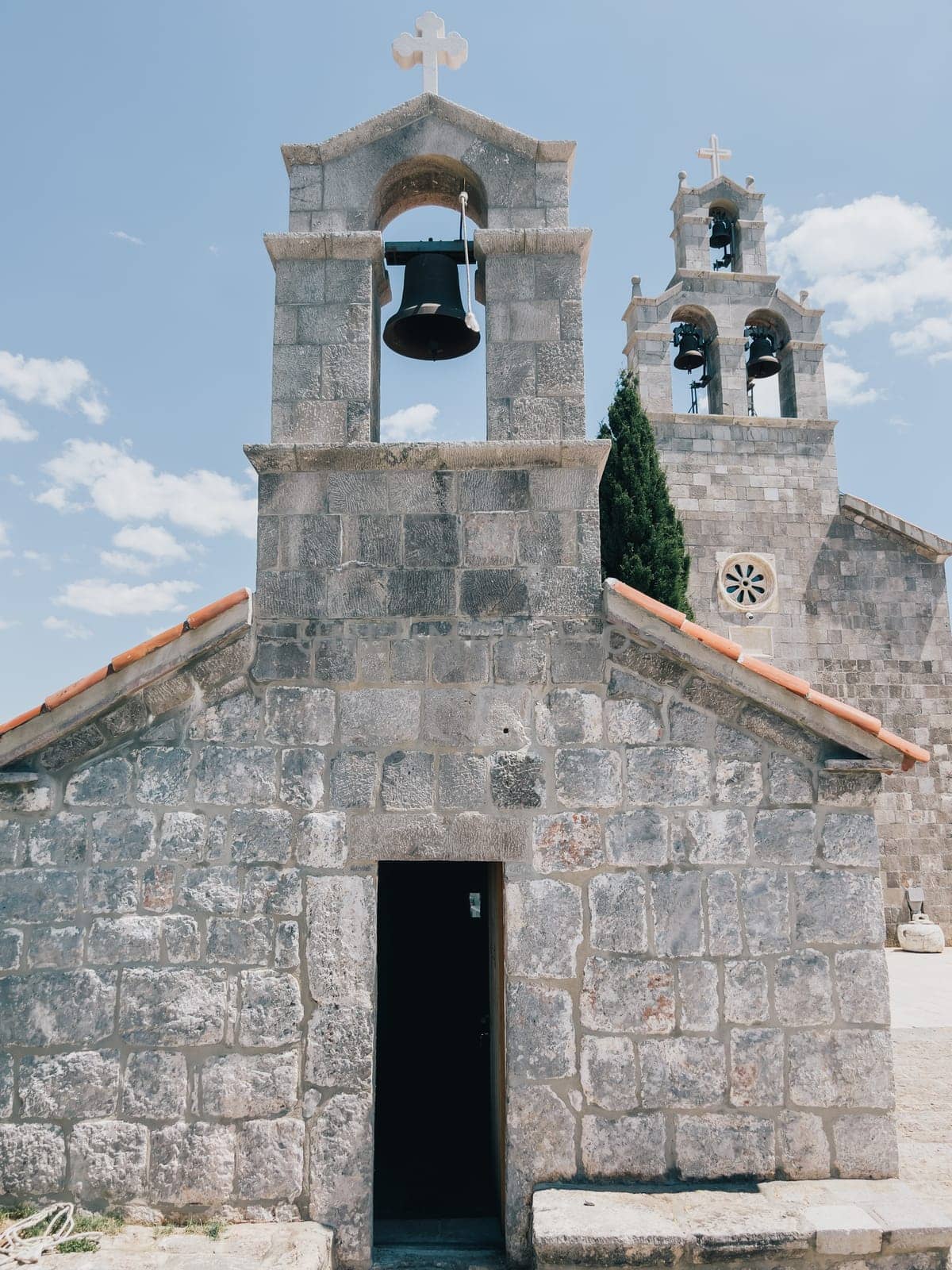 Small bell tower of the Church of the Holy Trinity. Budva, Montenegro. High quality photo