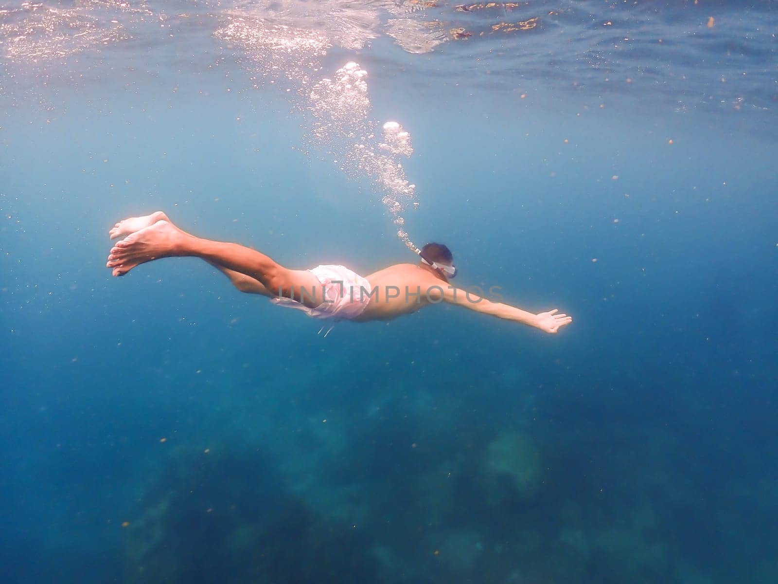 snorkeling trip at Samaesan Thailand dive underwater with fishes in the coral reef sea pool by fokkebok