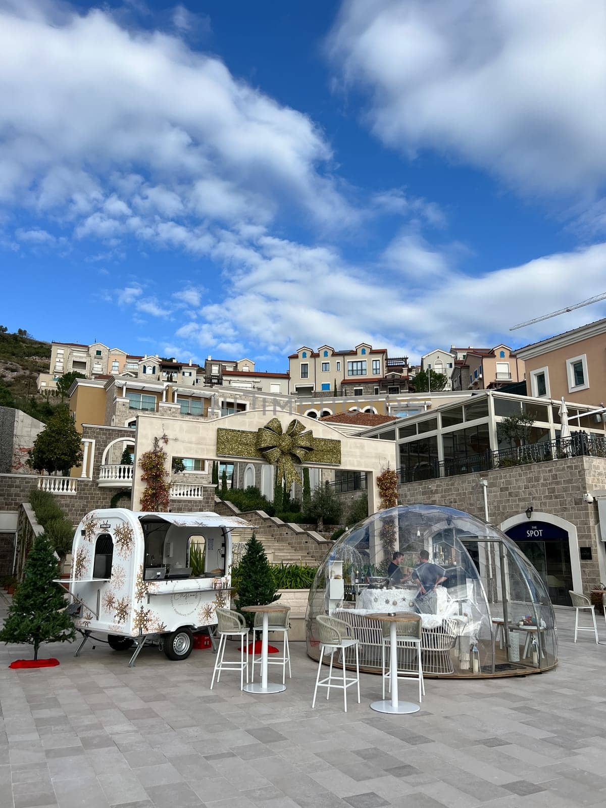 Lustica, Montenegro - 01 november 2023: Domed transparent gazebo near the restaurant on the street by Nadtochiy