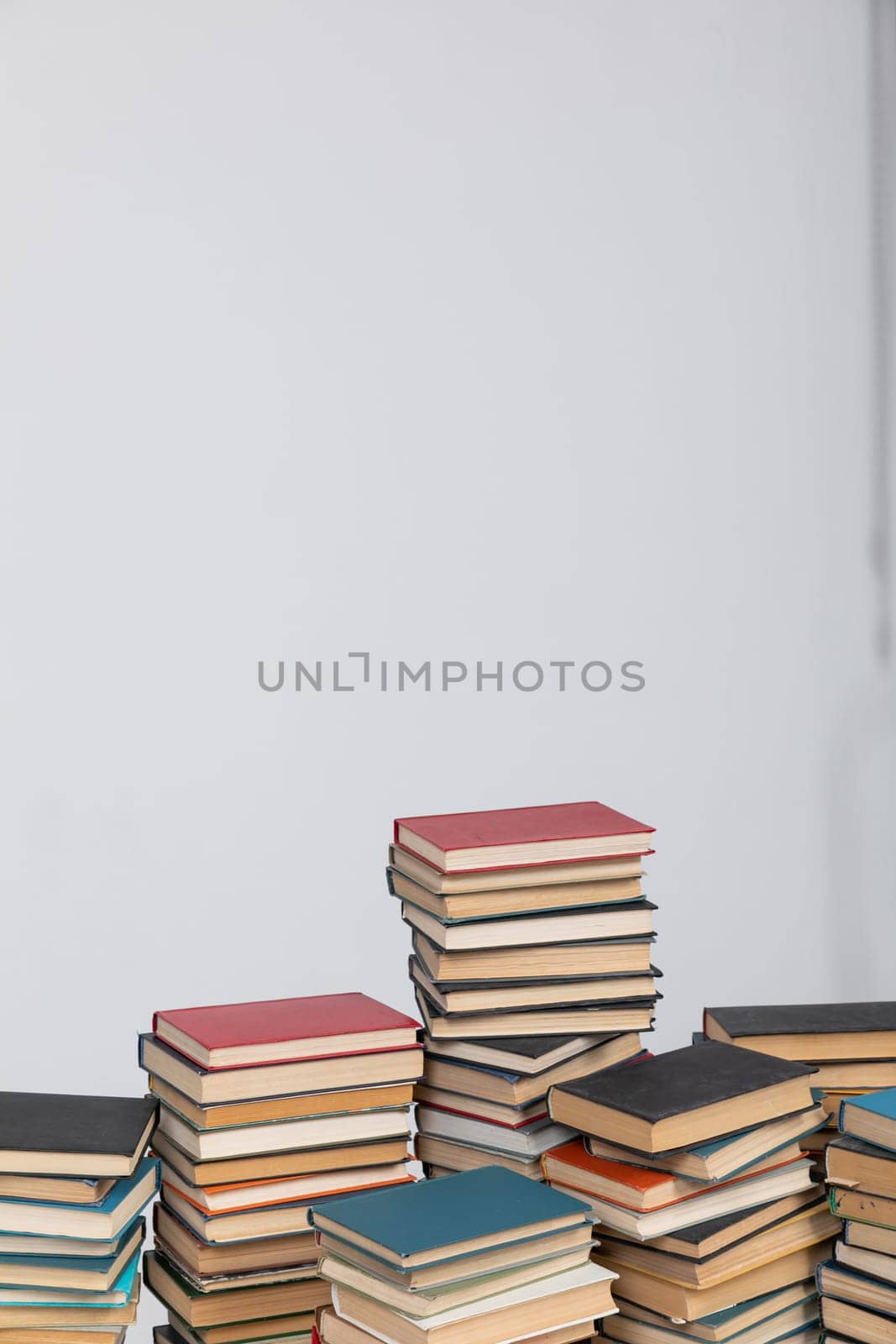 stack of books on a light background library