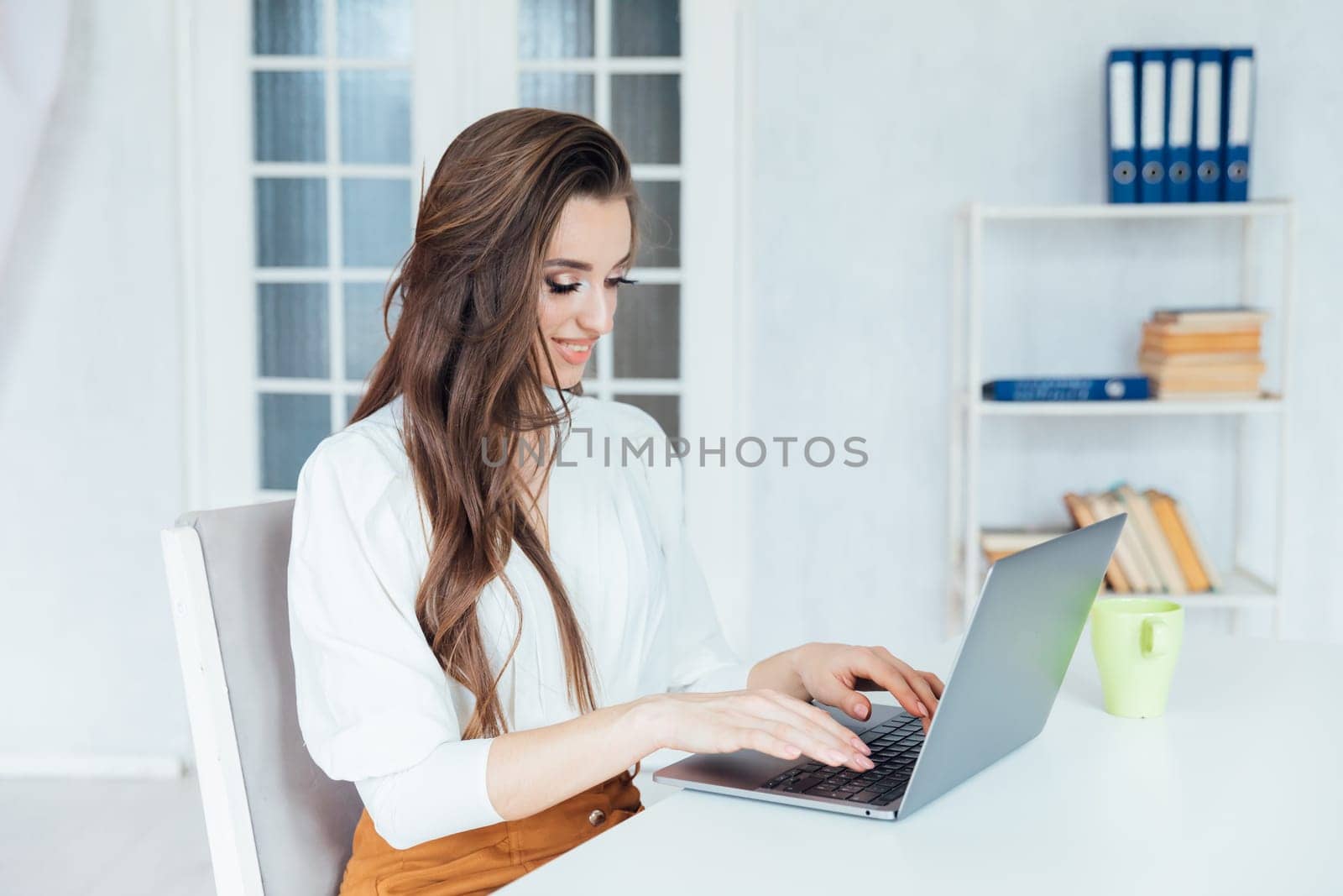 brunette with laptop communication online remote work