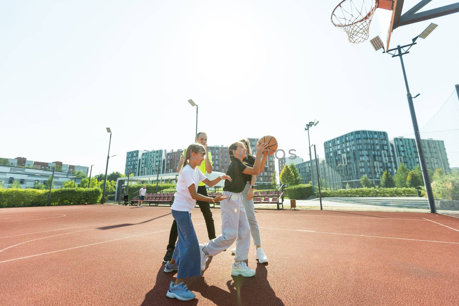 Basketball with family make me happy. High quality photo