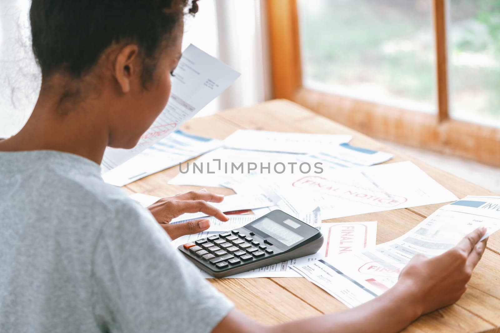 Stressed young woman has financial problems with credit card debt to pay crucial show concept of bad personal money and mortgage pay management crisis. sad and unhappy