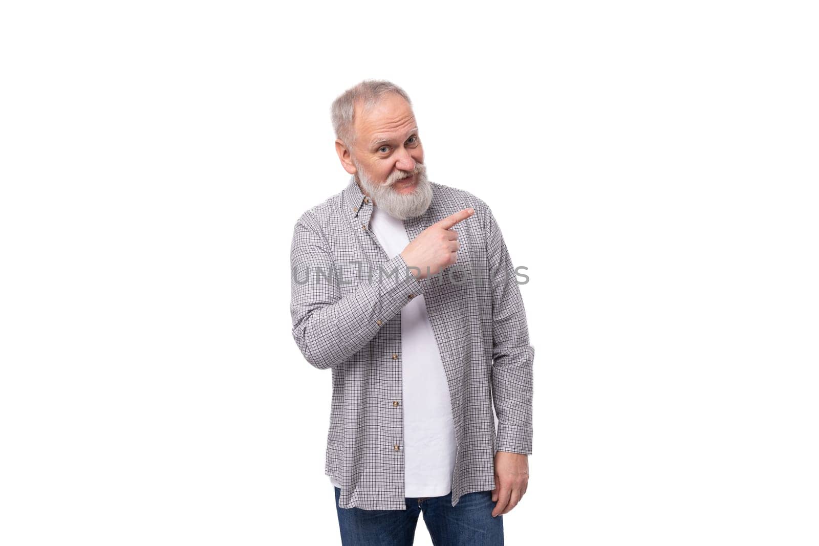handsome funny gray-haired elderly man with a beard and mustache in a plaid shirt on a white background with copy space.