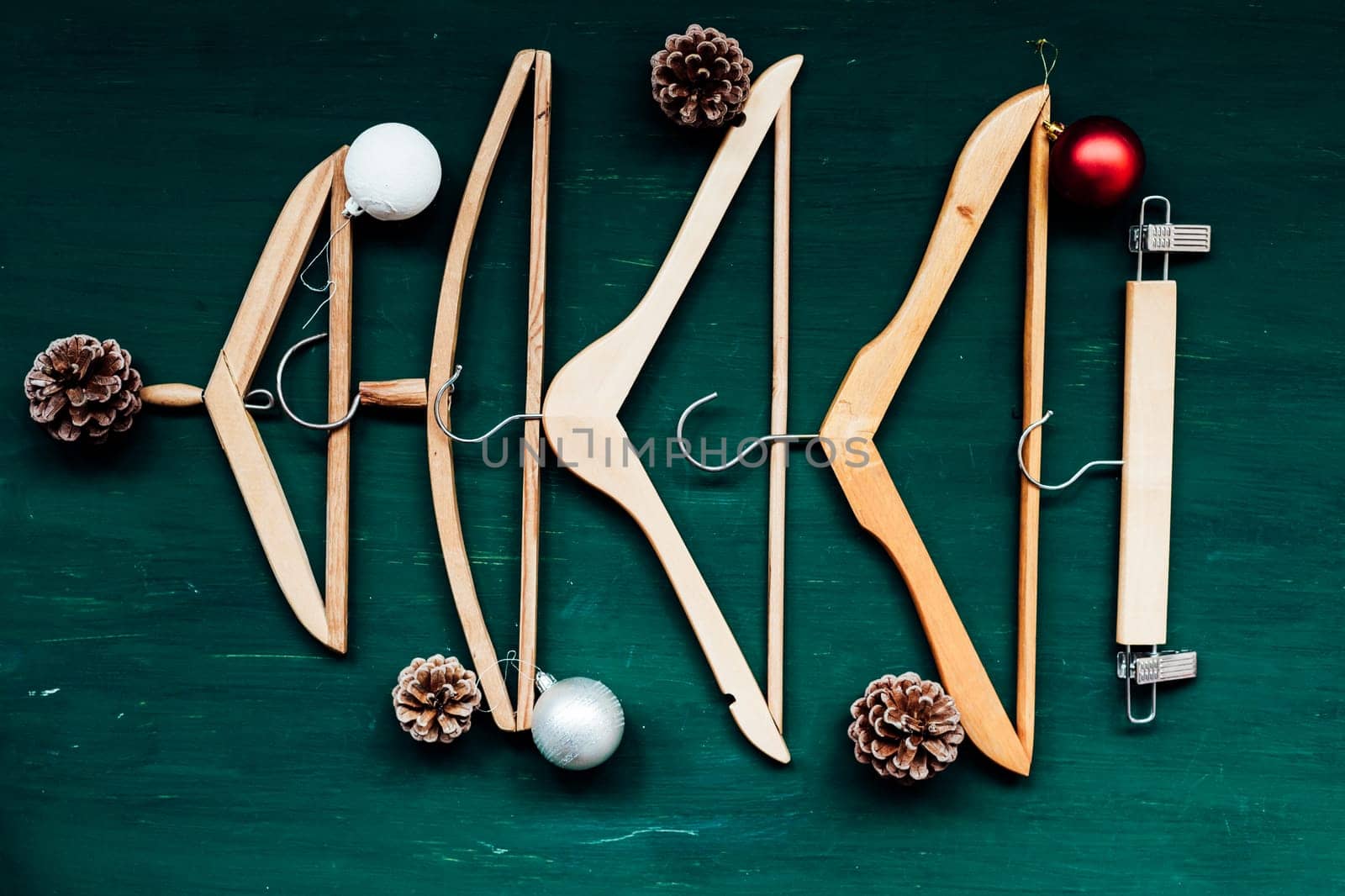hangers from the wardrobe of clothes on Christmas new year tree by Simakov