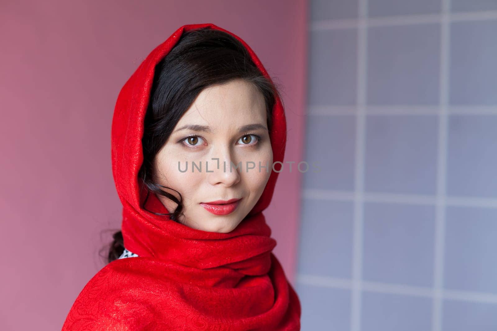 beautiful Asian woman with a red headscarf on her head