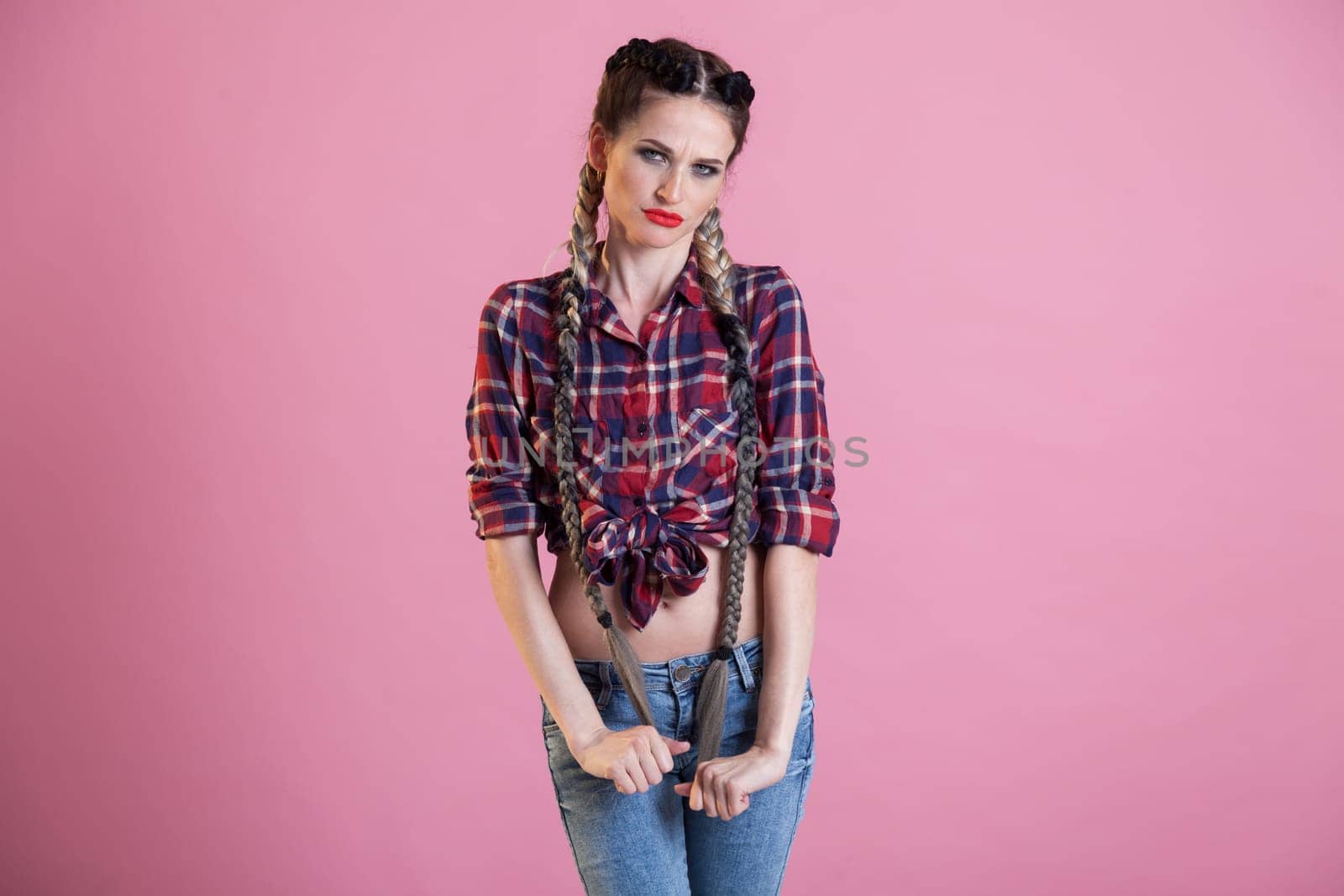 Beautiful woman braids in country shirt