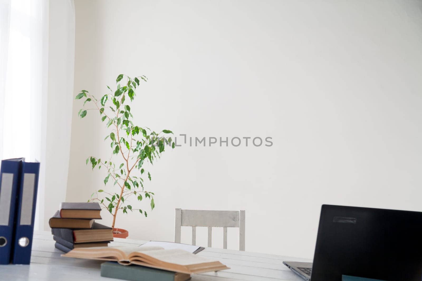 empty office business with computer and books