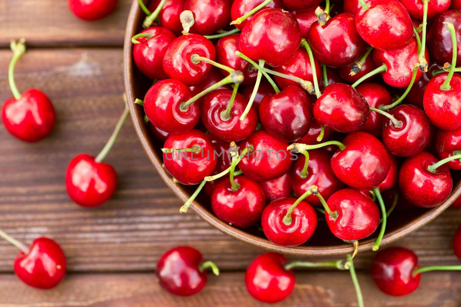 Ripe juicy berries cherries in a bowl. Freshly picked ripe cherries in a bowl