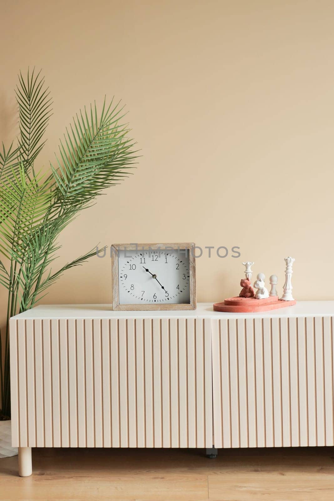 simple modern clock on table .