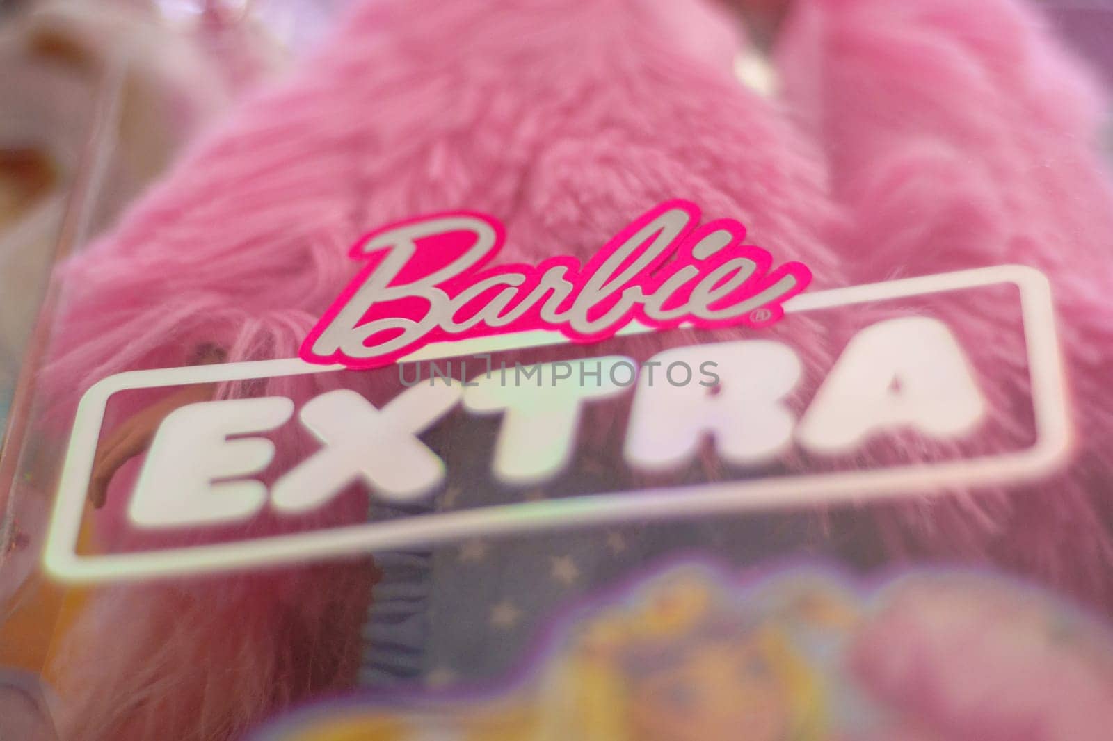 Tyumen, Russia-November 25, 2023: Barbie extra logo, produced by the American toy manufacturing company Mattel, Inc. Selective focus