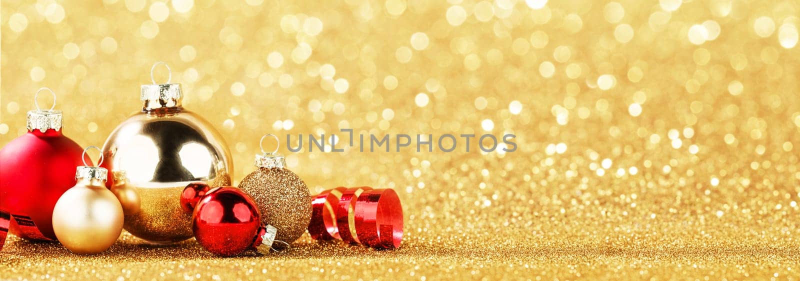 red and gold christmas balls on bokeh background