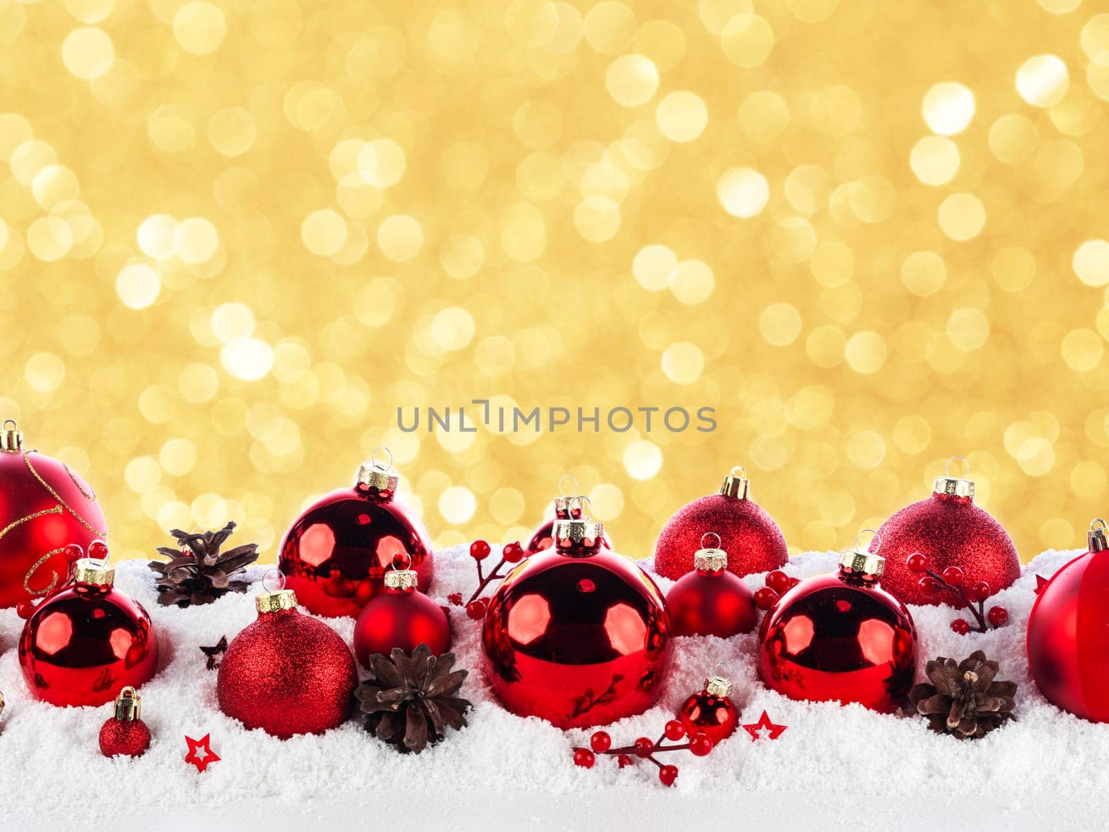 red christmas balls long frame on snow background