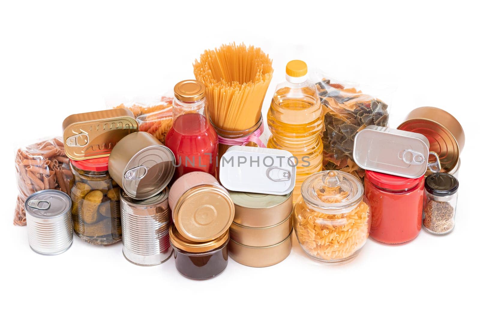 Food Reserves: Canned Food, Spaghetti, Tomato Juice, Pasta and Grocery - Isolated on White Background. Emergency Food Storage in Case of Crisis. Strategic Food Supplies - Isolation