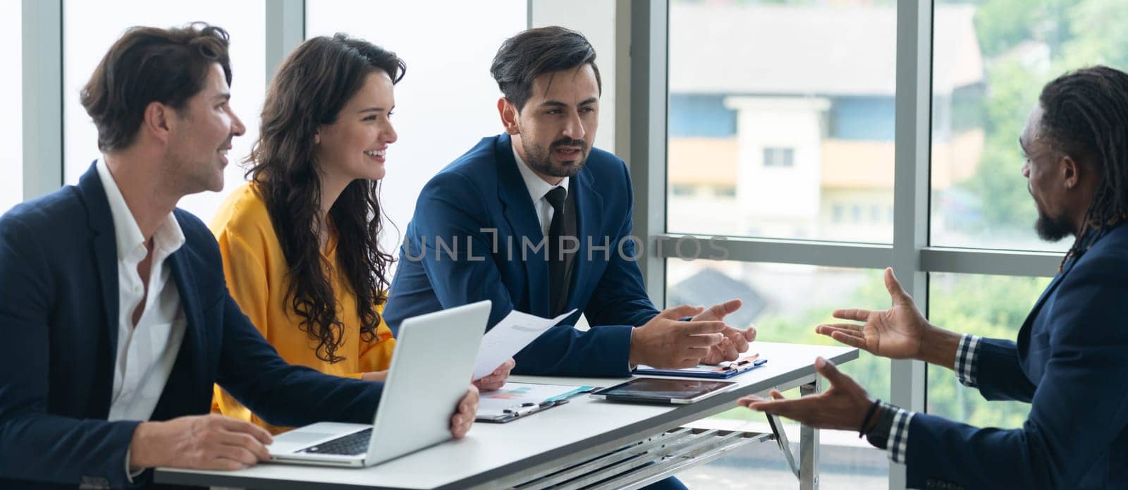 Diversity recruiters interview candidate at the bright office. A group of human resources professionals explaining an applicant for a new position. asking interviewee a question. Intellectual.