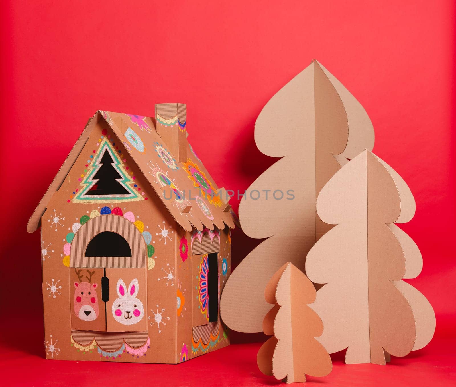 Christmas Tree and Cardboard playhouse Made Of Cardboard. Unique Trees. New Year or Xmas