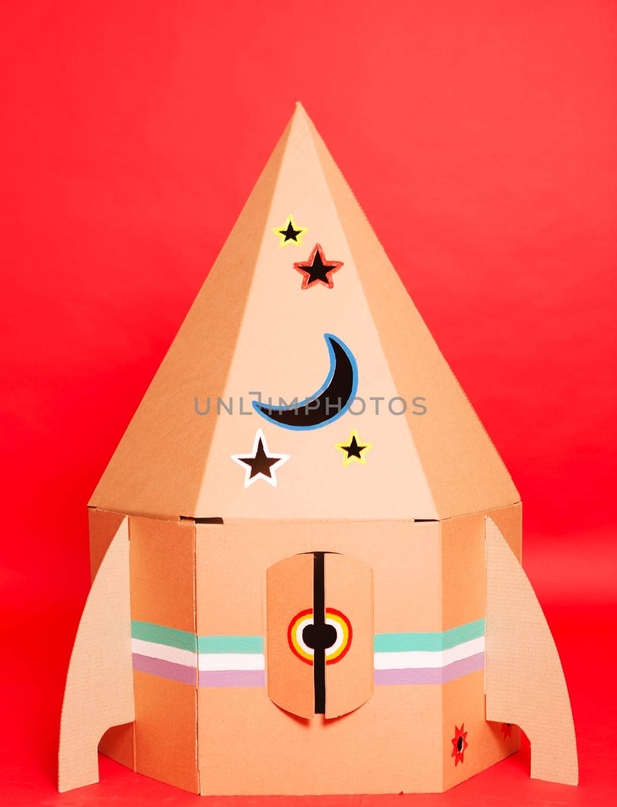 Cardboard space rocket. Concept image. by sarymsakov