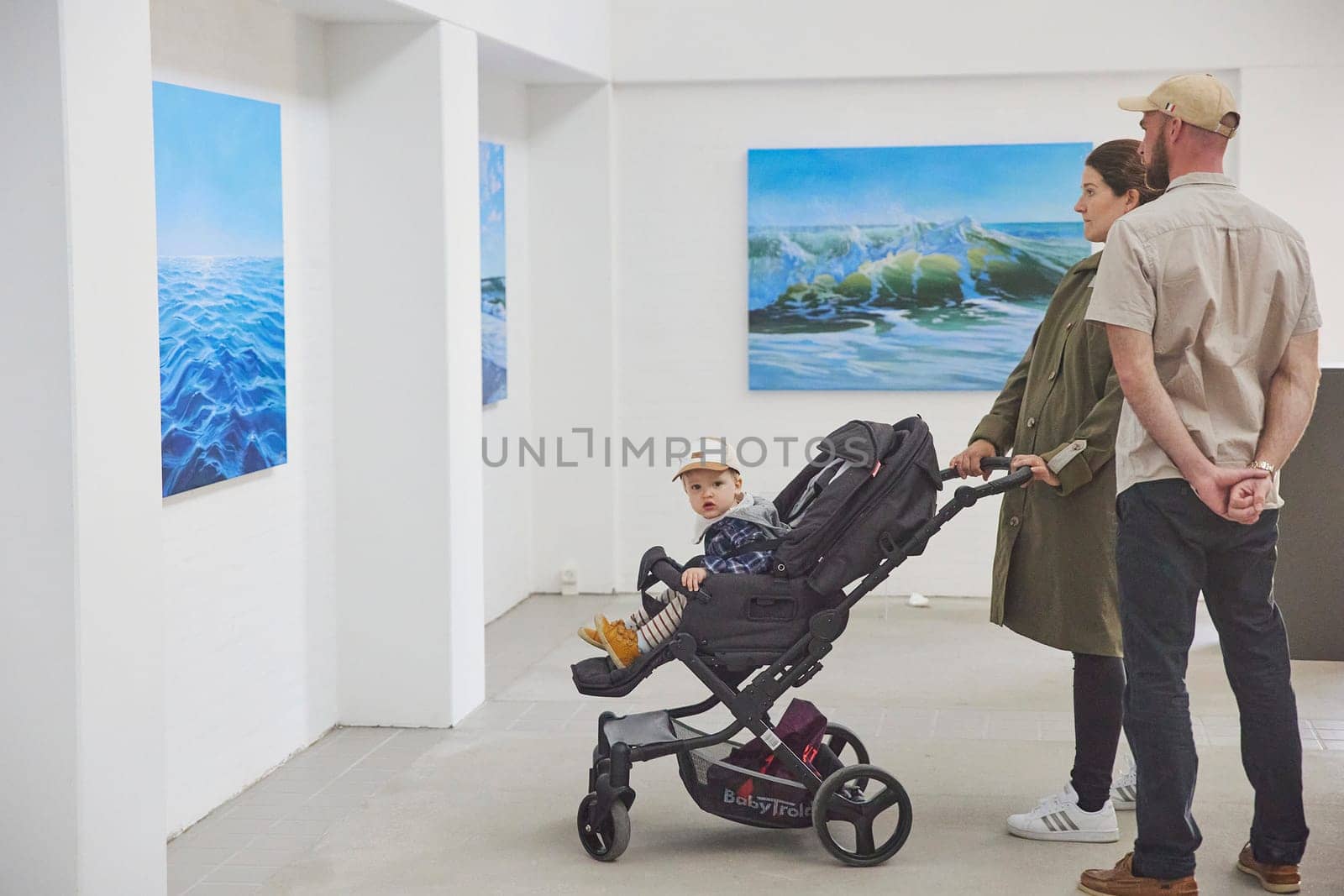 Skagen, Denmark, May, 2023: Visitors look at the paintings in the gallery