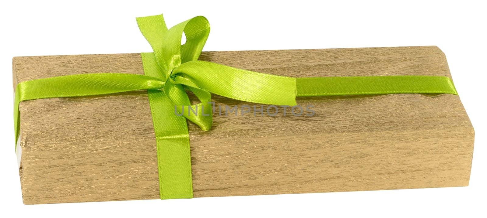 Box is wrapped in yellow gift wrapping and green ribbon on a white isolated background