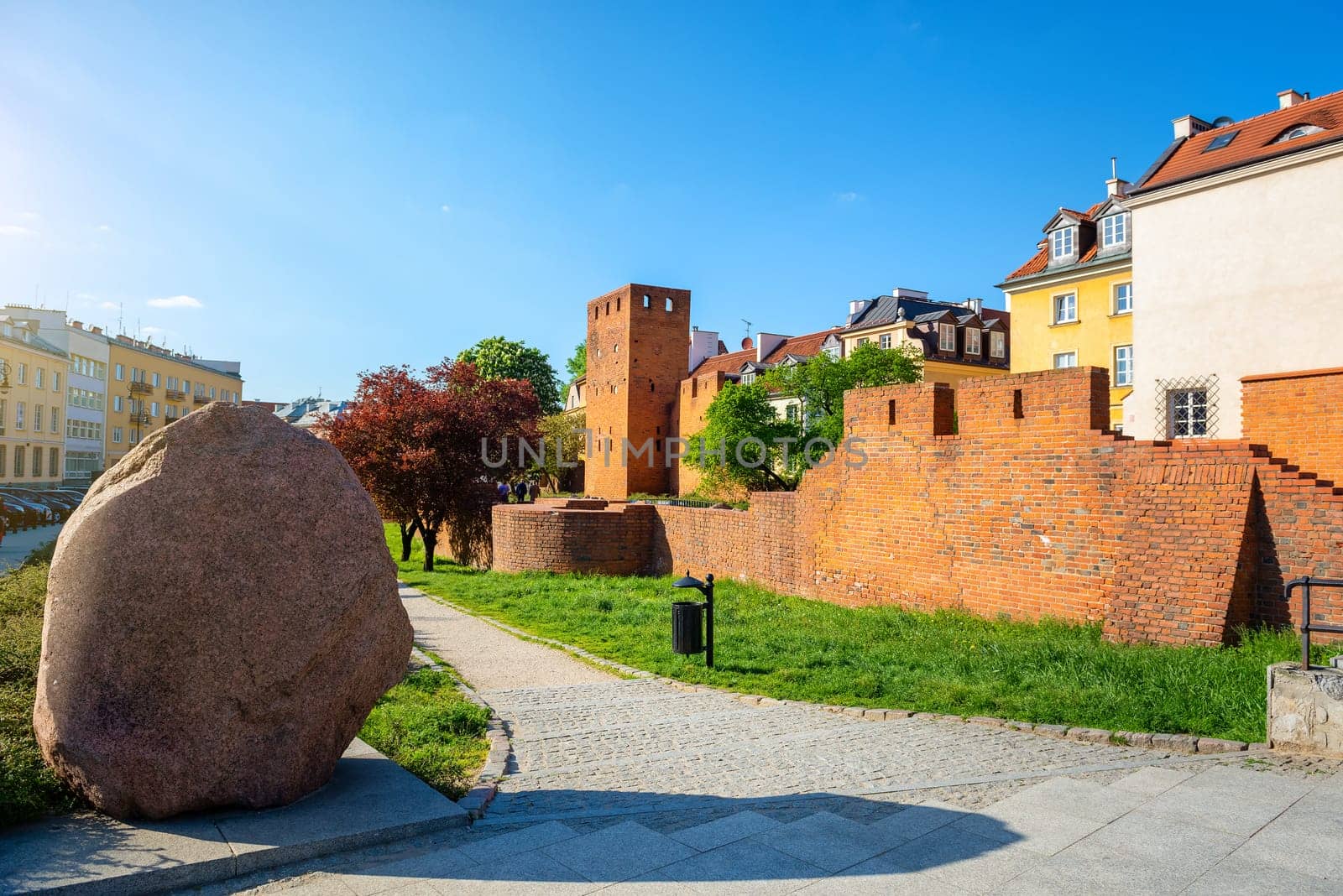 Wall and old town in Warsaw by Givaga