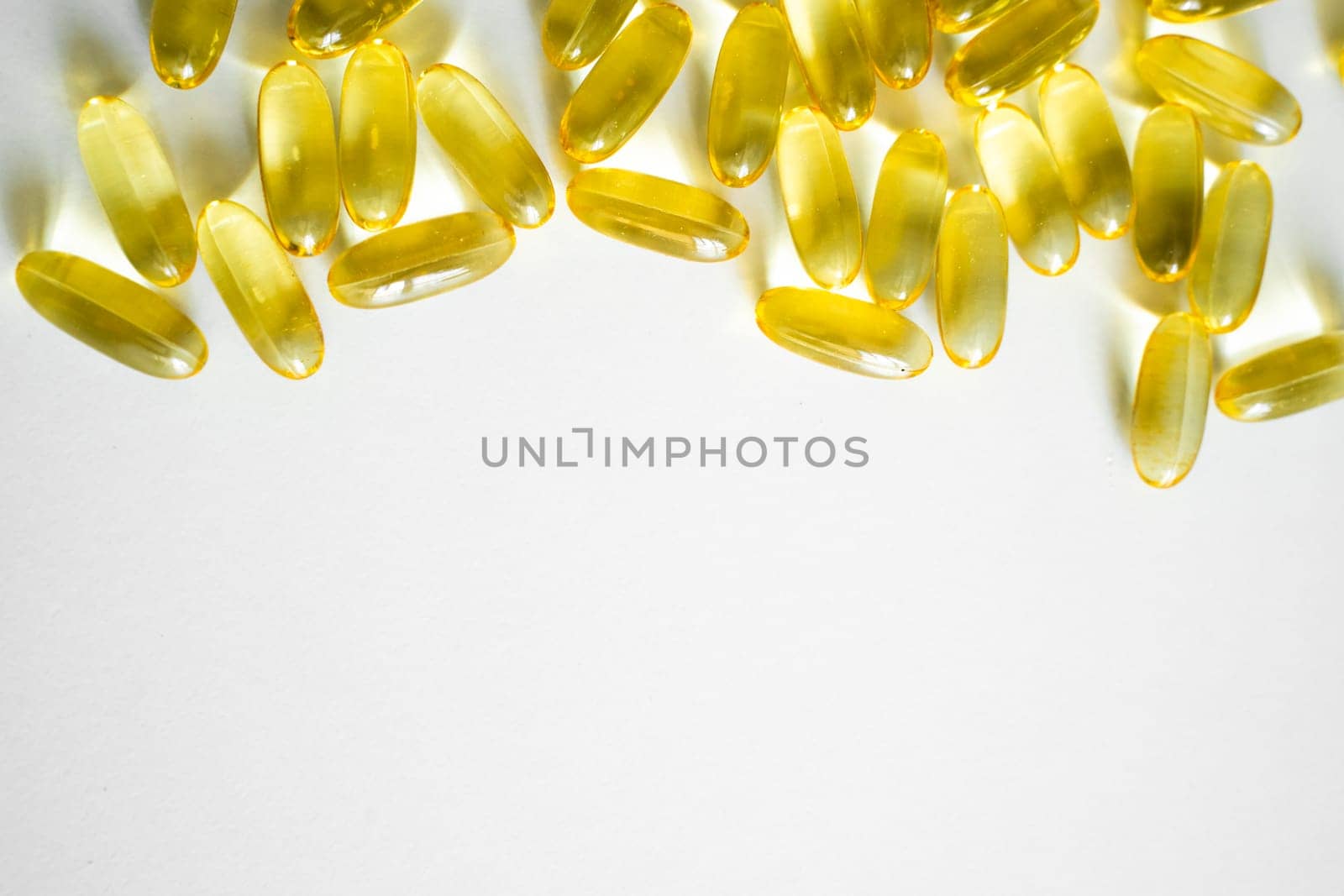 Cod liver oil omega 3 gel capsules. Fish oil capsules with omega 3 on white background. by vovsht