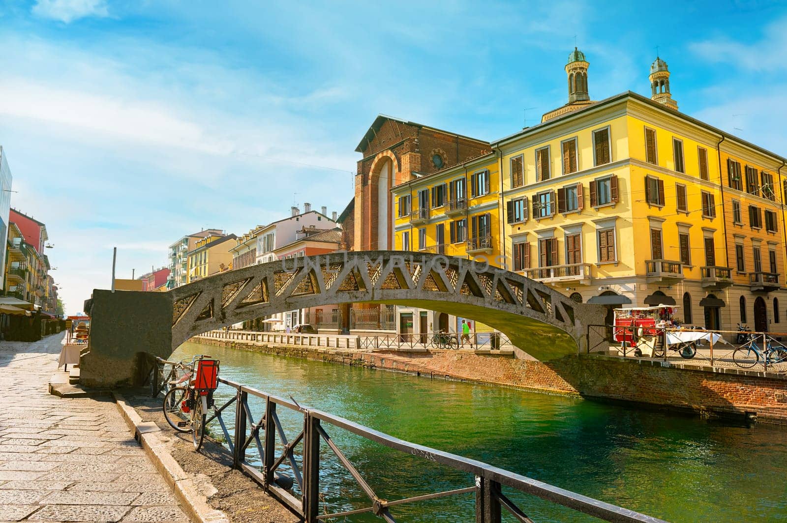 View of Naviglio Grande canal with arched footbridge Alda Merini