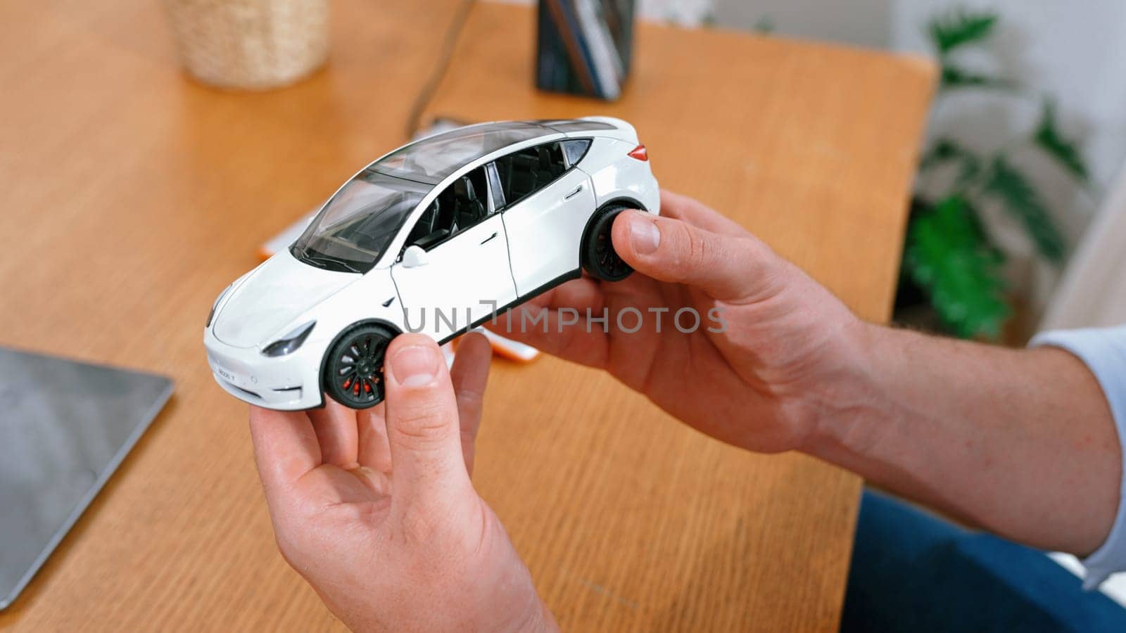 Car design engineer analyze car model prototype. Synchronos by biancoblue
