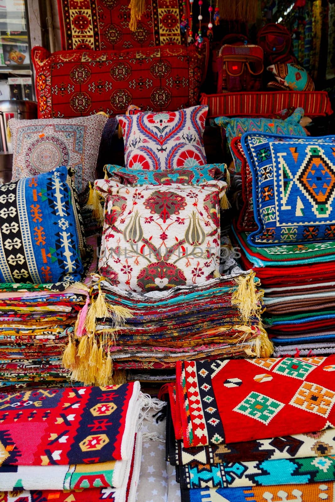 Colourful cushions on display for sale in a traditional Turkish Bazaar. by towfiq007