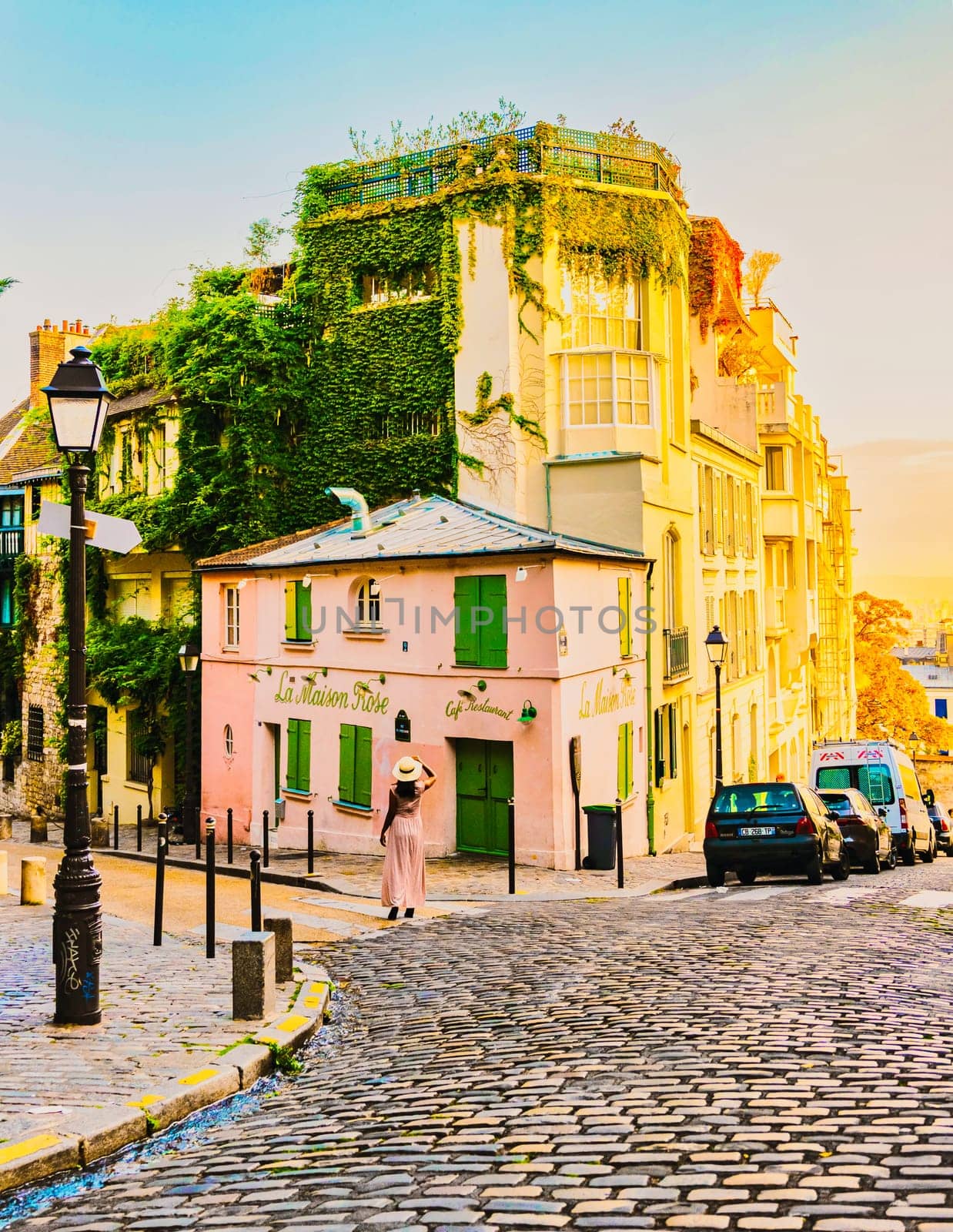Paris France Streets of Montmartre in the early morning with cafes and restaurants by fokkebok