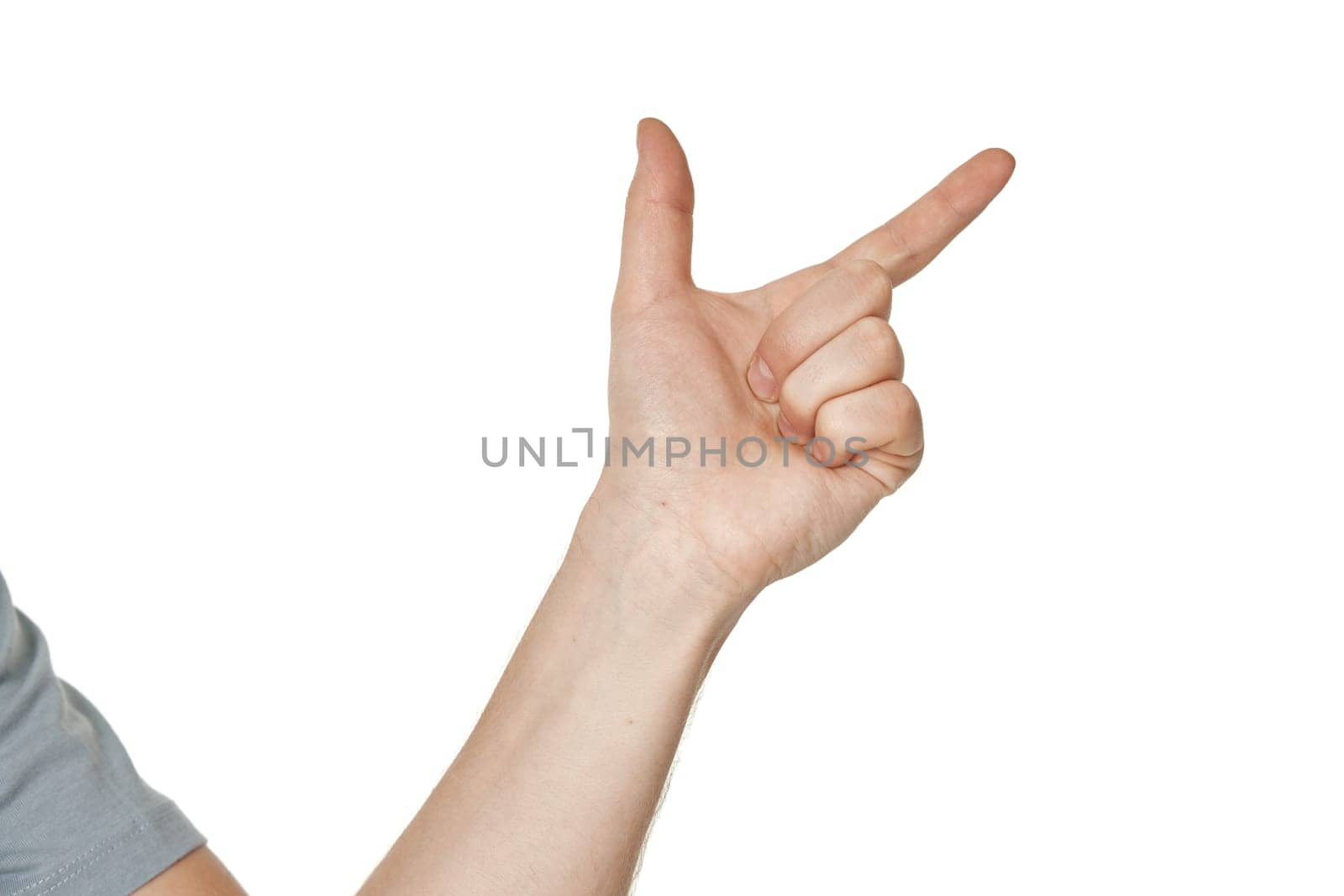 male hand pointing to the right with the index finger on white background