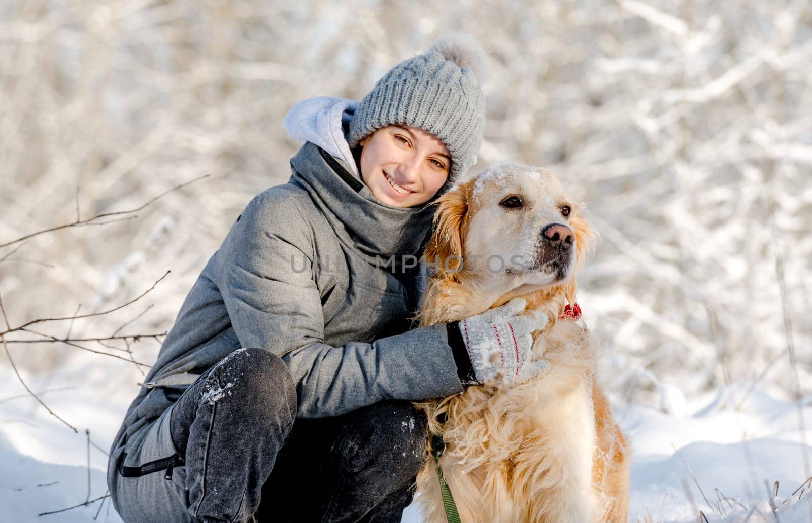 Teenage Girl And Golden Retriever In Winter Forest by tan4ikk1